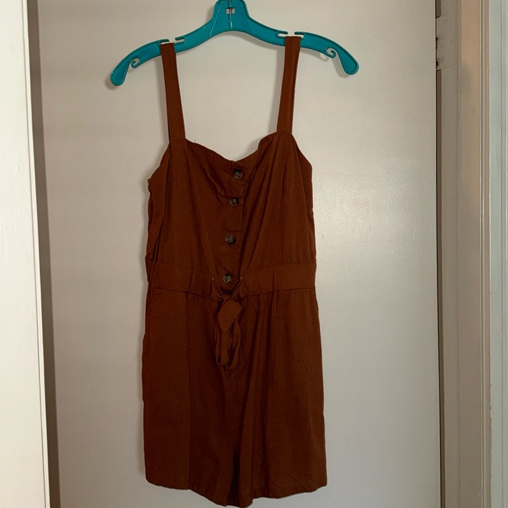 Timing Romper! New with Tag Size Small.